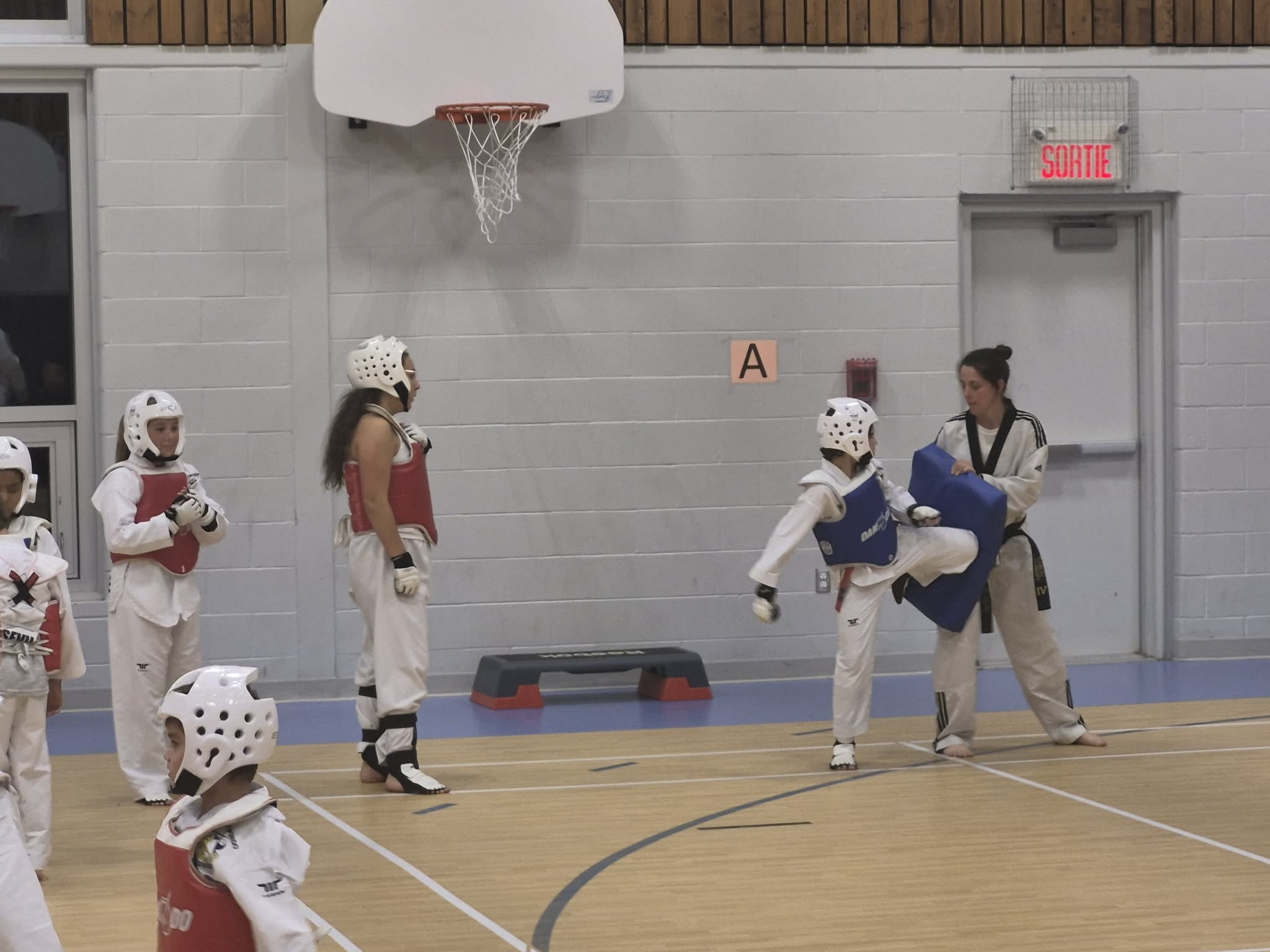 Élèves du club réunis dans le dojang